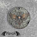 A vintage style metal neck plate for electric guitars with skull moth design. The diameter is 54mm and the thickness is 3mm.