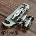 A silver Wilkinson wraparound bridge for electric guitars like Gibson. It has high quality and is perfect for guitar building.