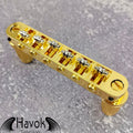 A gold tune-o-matic bridge for 6 string electric guitars like Gibson. It is has high quality and perfect for guitar building.